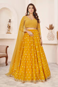 Yellow georgette lehenga choli with multi-colored thread and sequins embroidery