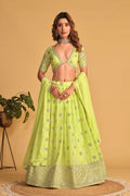 Neon green georgette lehenga choli with heavy silver sequins and zari embroidery