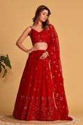 Classic red georgette lehenga choli with detailed sequins and thread embroidery
