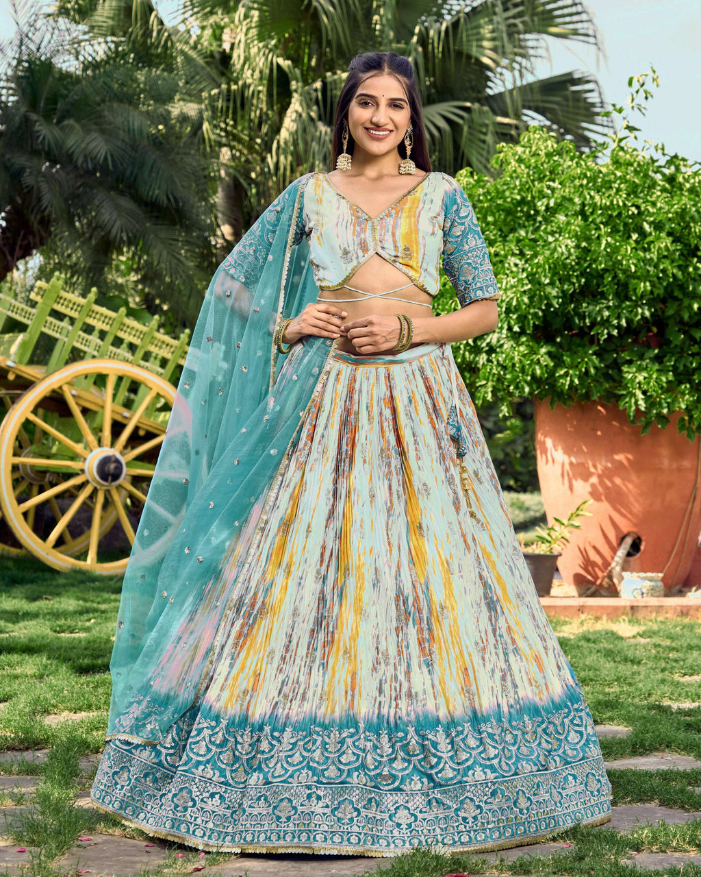 Rama Chinon digital print lehenga with sequins and zari embroidery on a professional model
