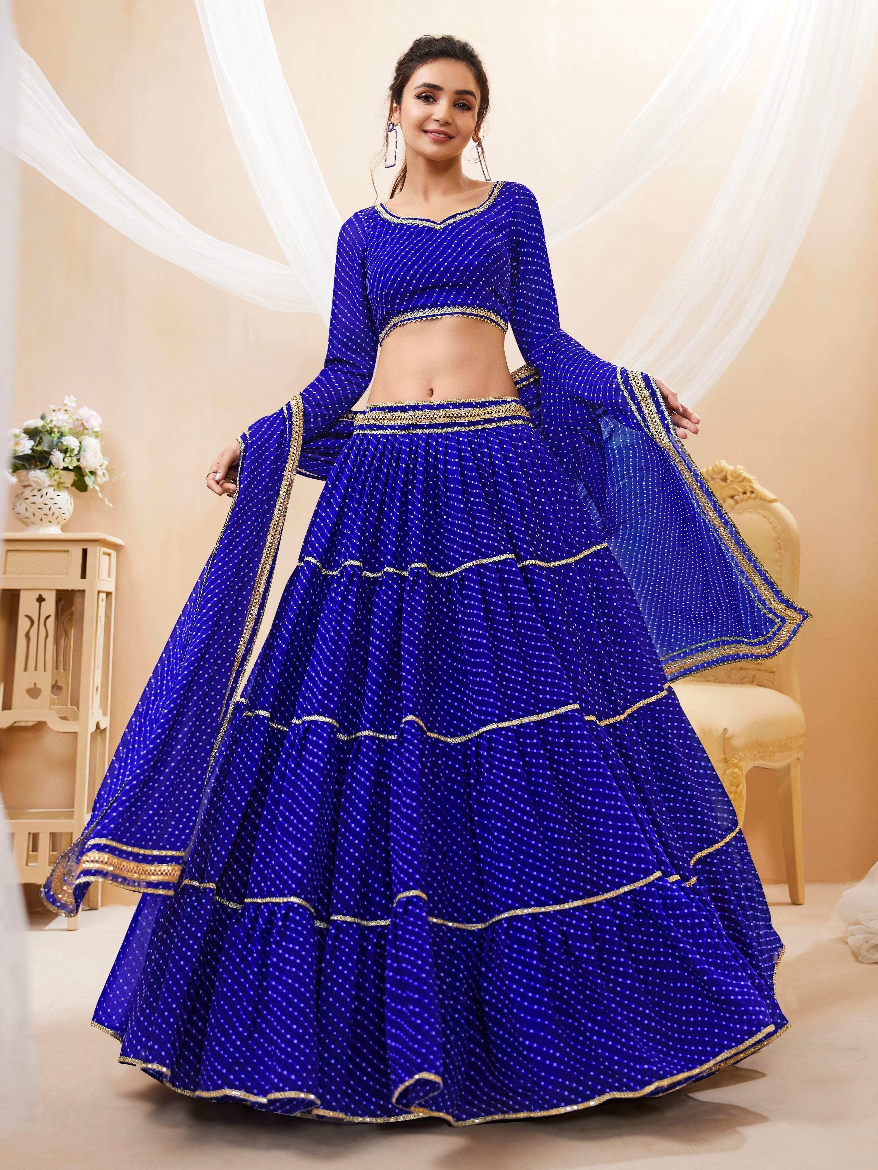Blue Leheriya print georgette lehenga choli with lace detailing