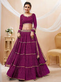 Purple Georgette Lehenga Choli featuring traditional Leheriya print and elegant lace border work.