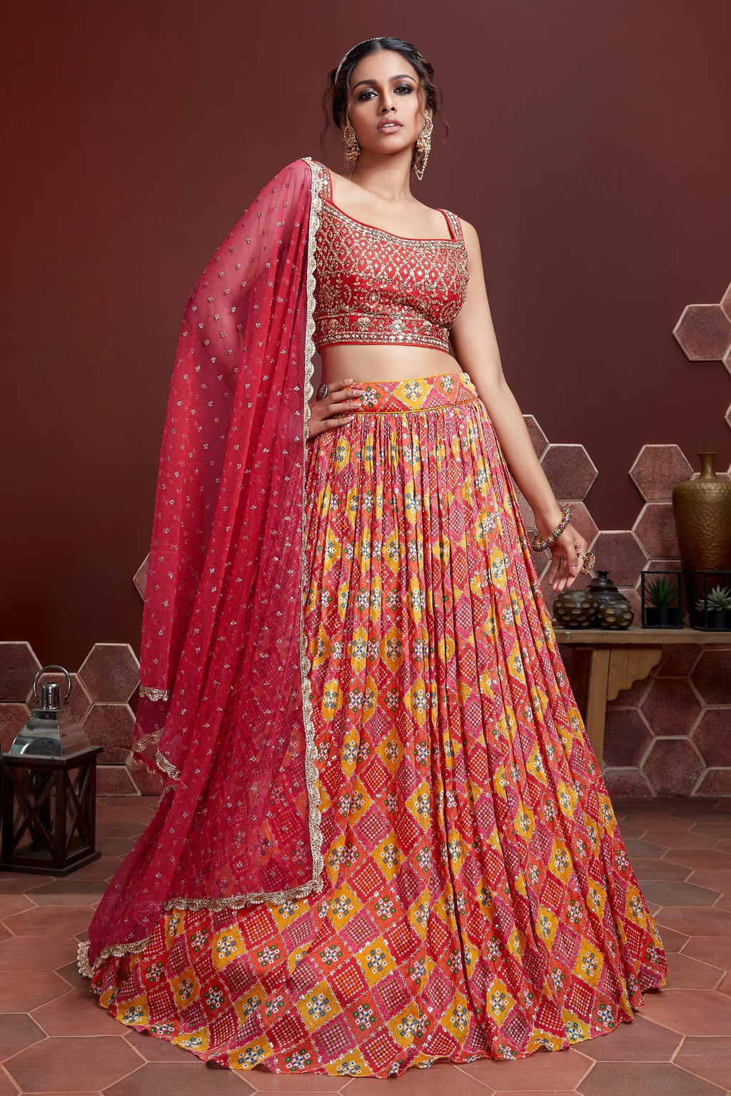 Red Pure Chinon Silk lehenga choli with heavy embroidery and mirror work