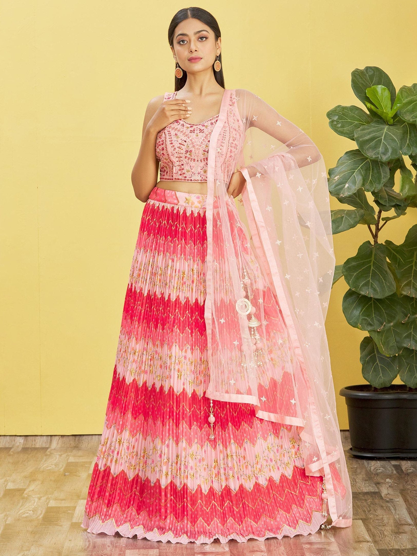Pink Chinon lehenga choli with real mirror work and sequins thread embroidery.