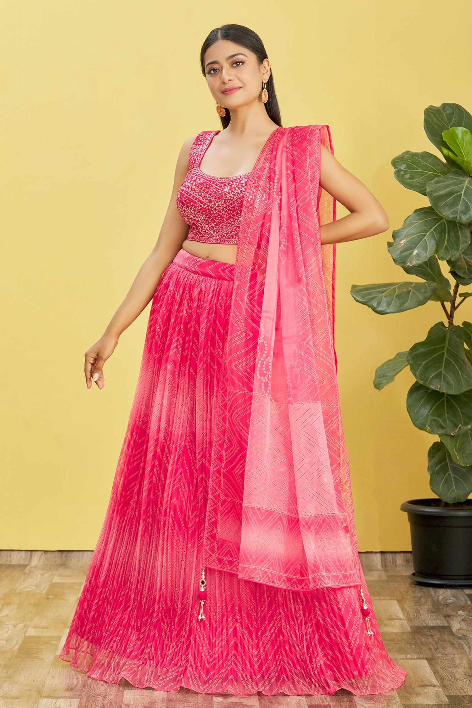 Pink Organza lehenga with real mirror work and sequins thread embroidery detail.