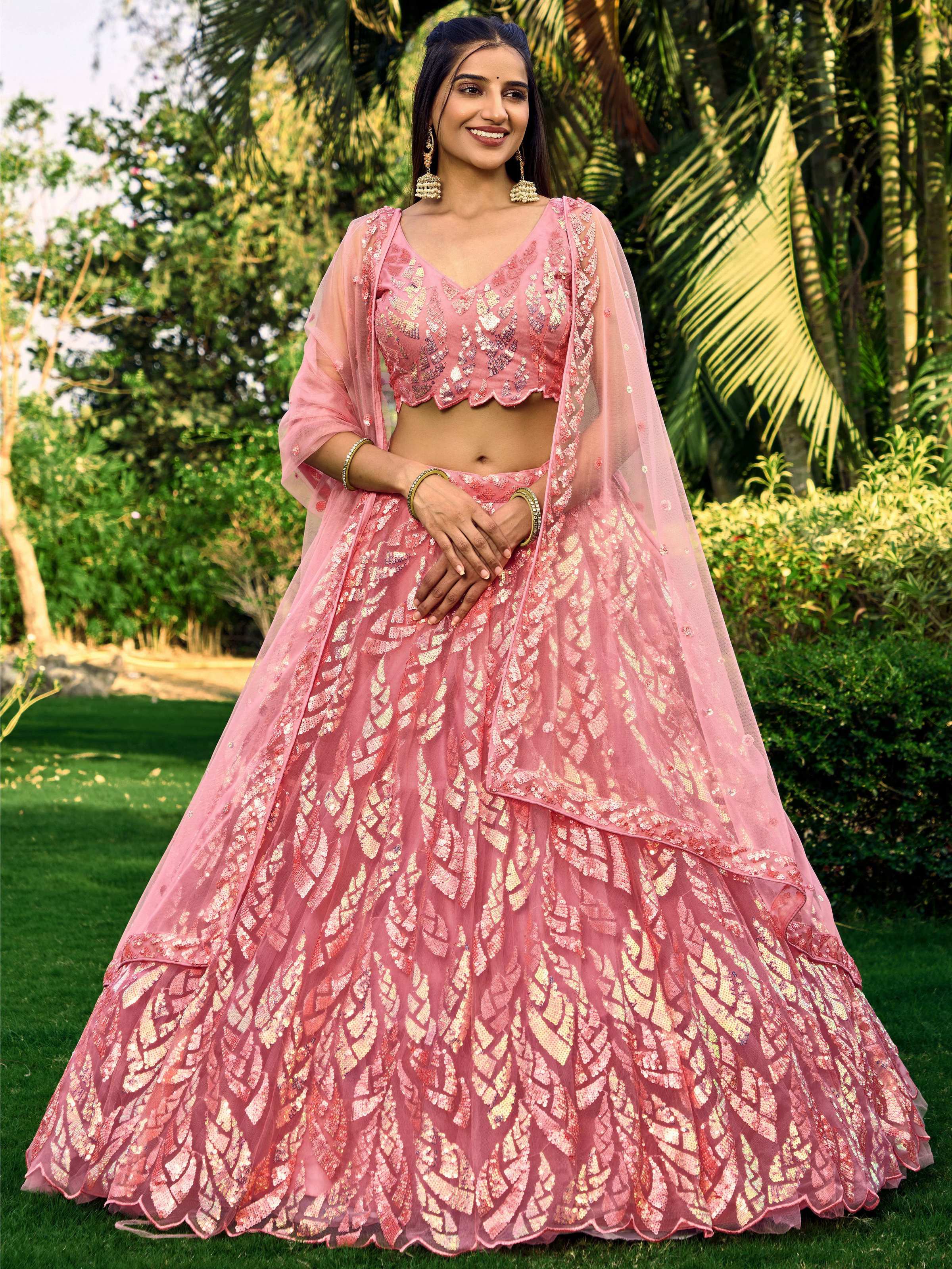 Pink soft net lehenga choli with intricate multi-sequin thread embroidery