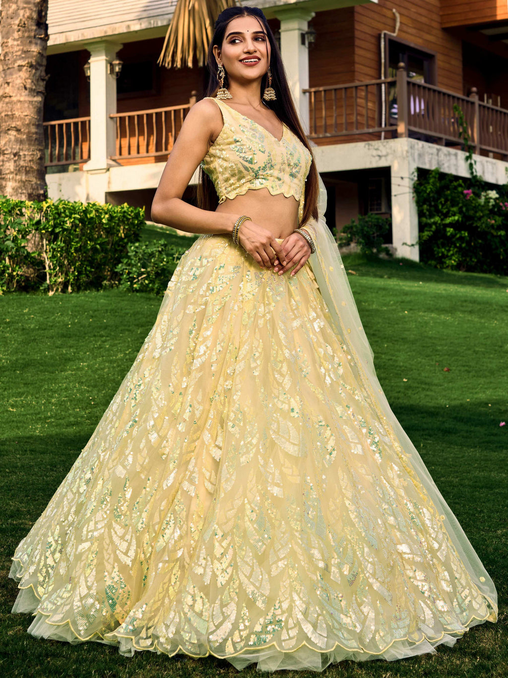 Yellow Soft Net Lehenga Choli with Multi-Sequins Thread Embroidery