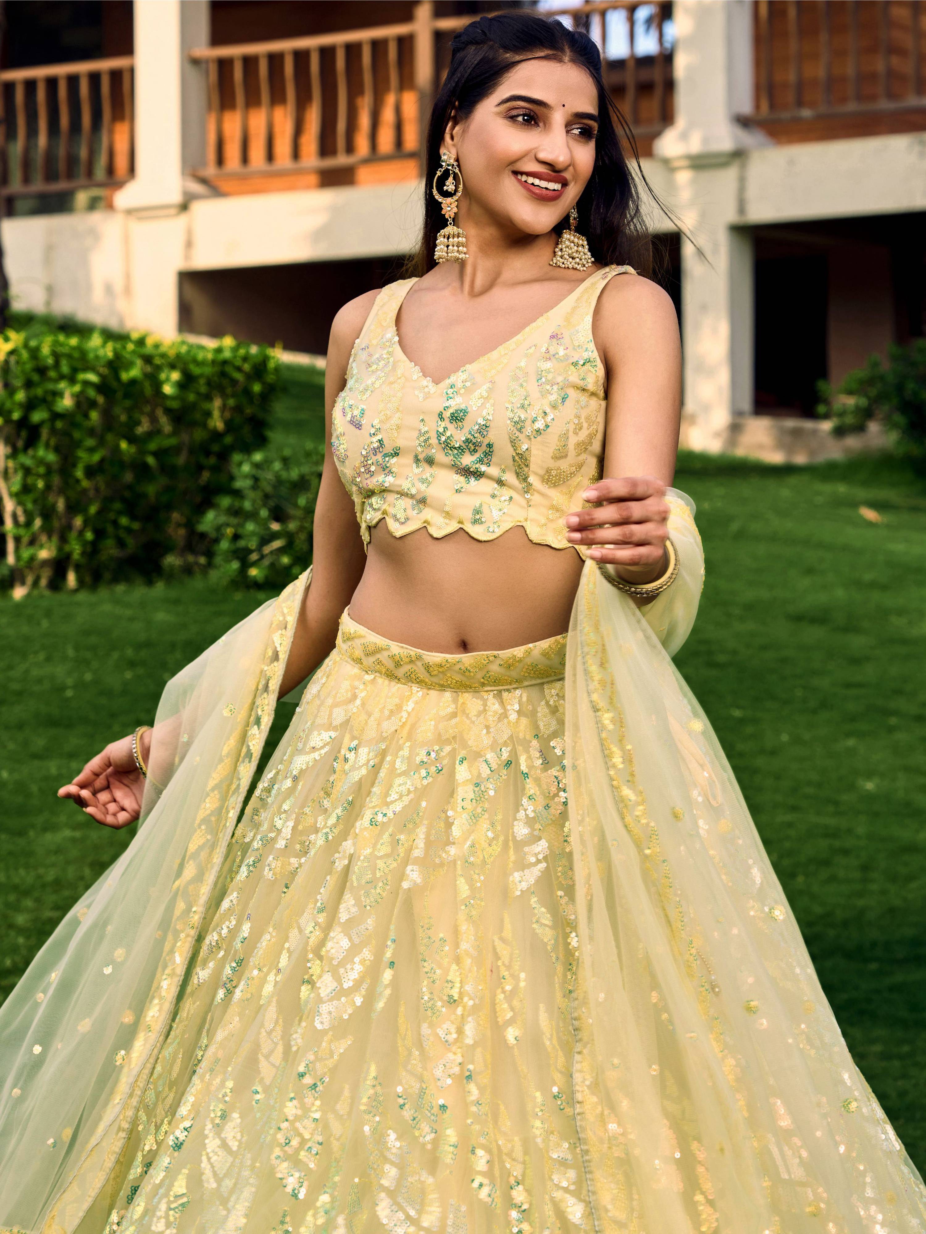 Yellow Soft Net Lehenga Choli with Multi-Sequins Thread Embroidery