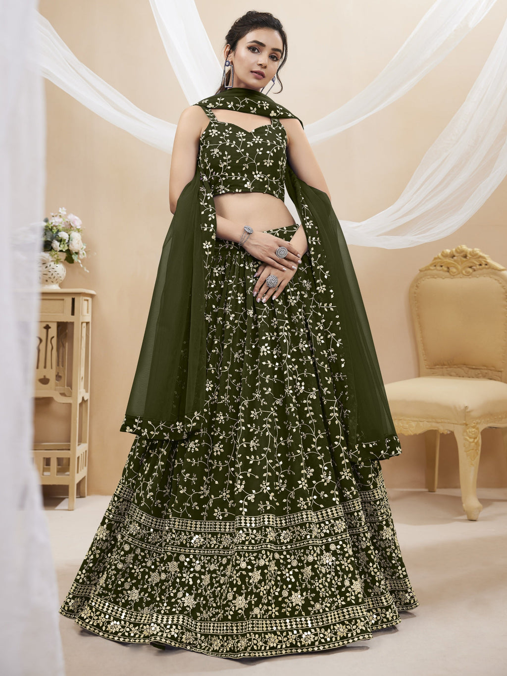 Green georgette lehenga choli with intricate zari and sequins embroidery