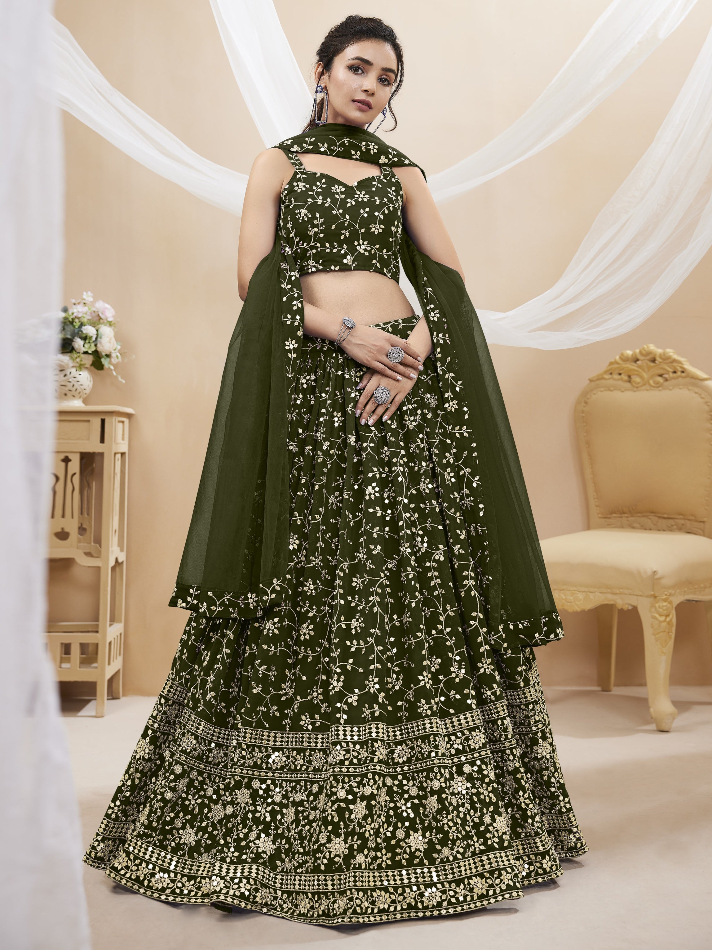 Green georgette lehenga choli with intricate zari and sequins embroidery