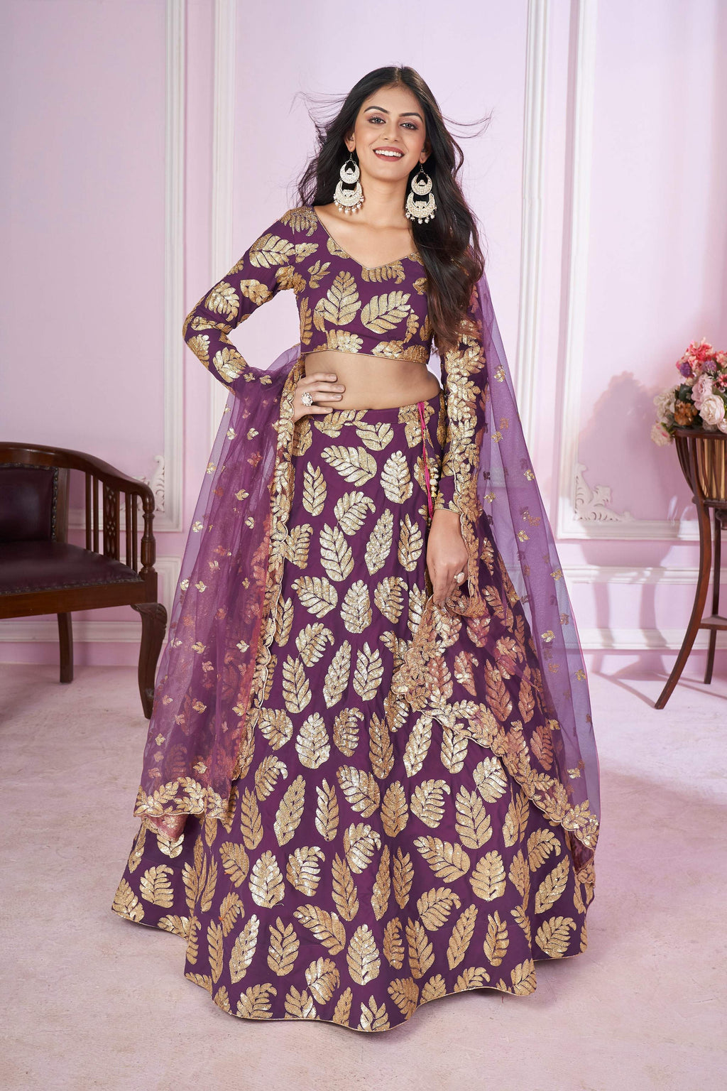 Purple Georgette Lehenga Choli adorned with sequins and Zari embroidery.