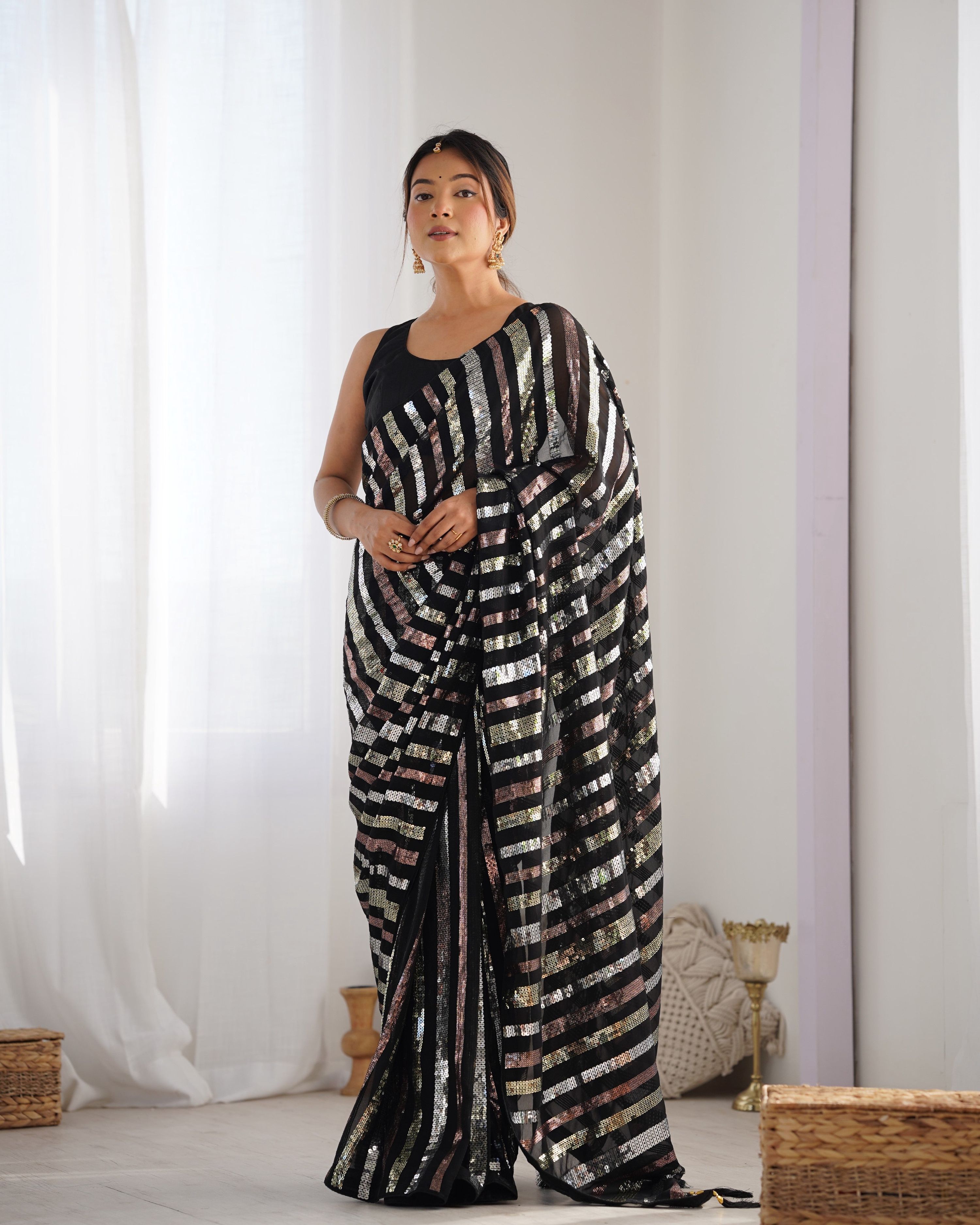 Black Georgette designer saree with multi-sequin embellishments and Banglory Silk blouse