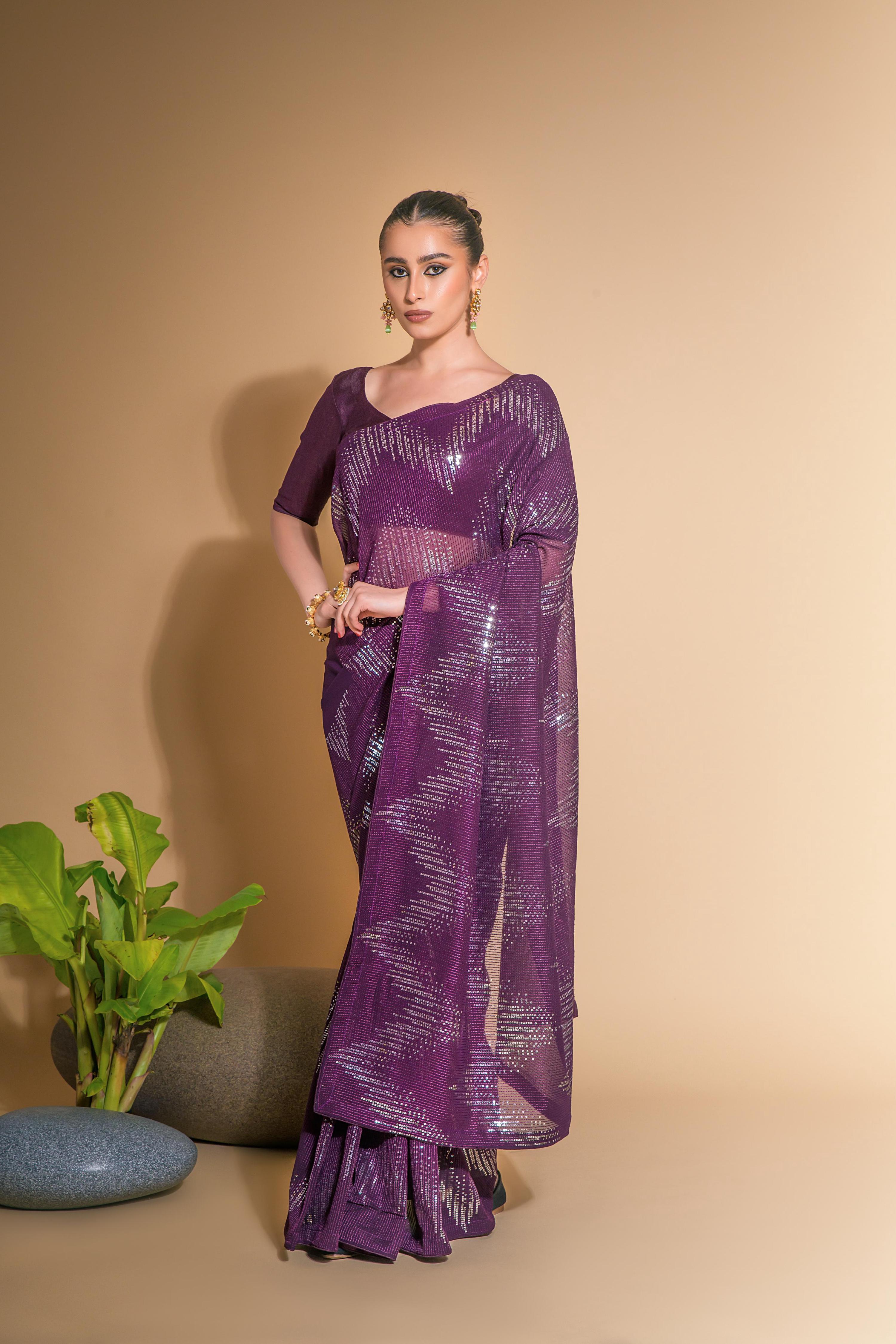 Wine colored georgette designer saree with sequins and unstitched blouse piece