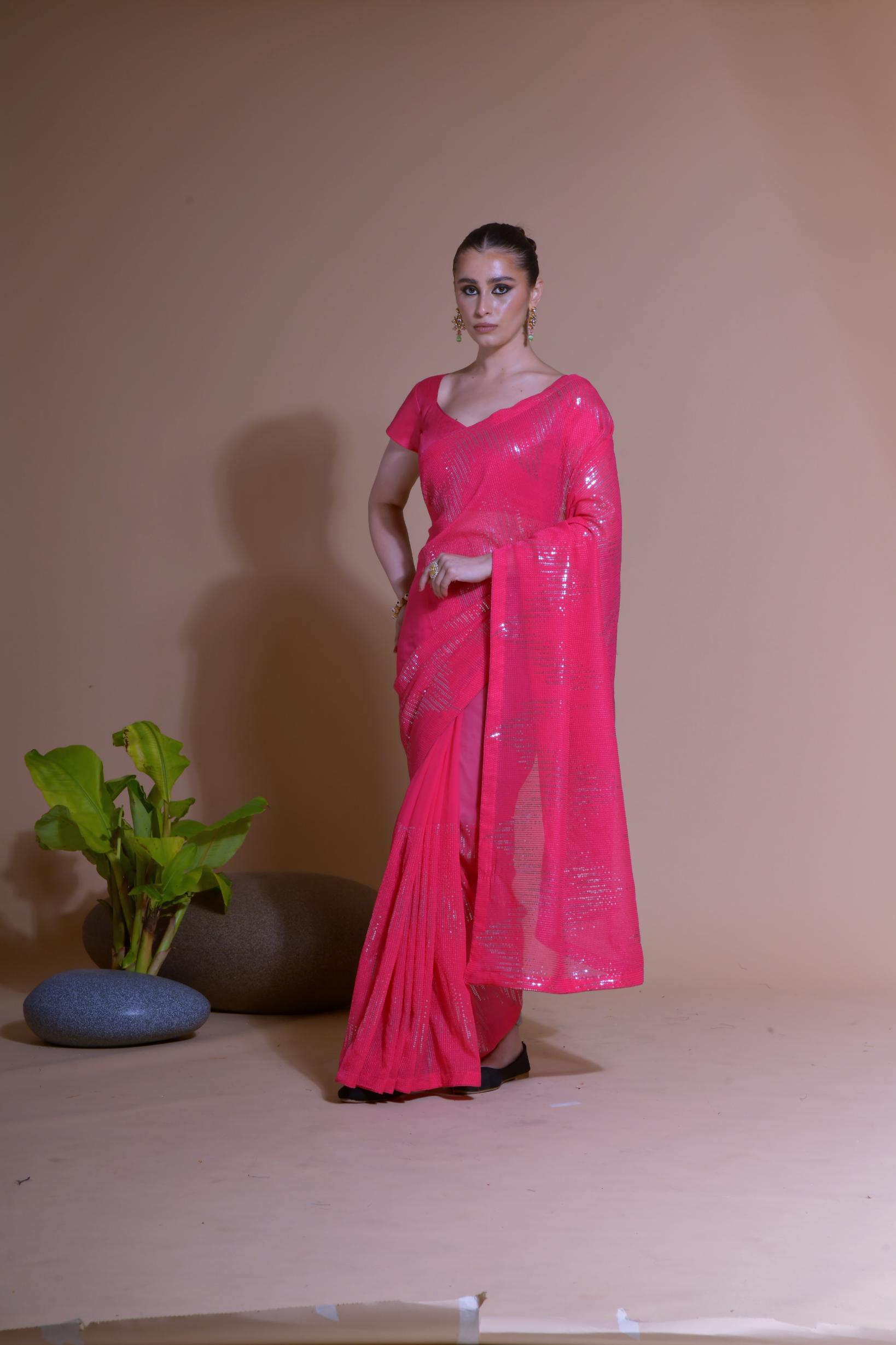 Pink georgette party wear saree with sequins embroidery and blouse piece