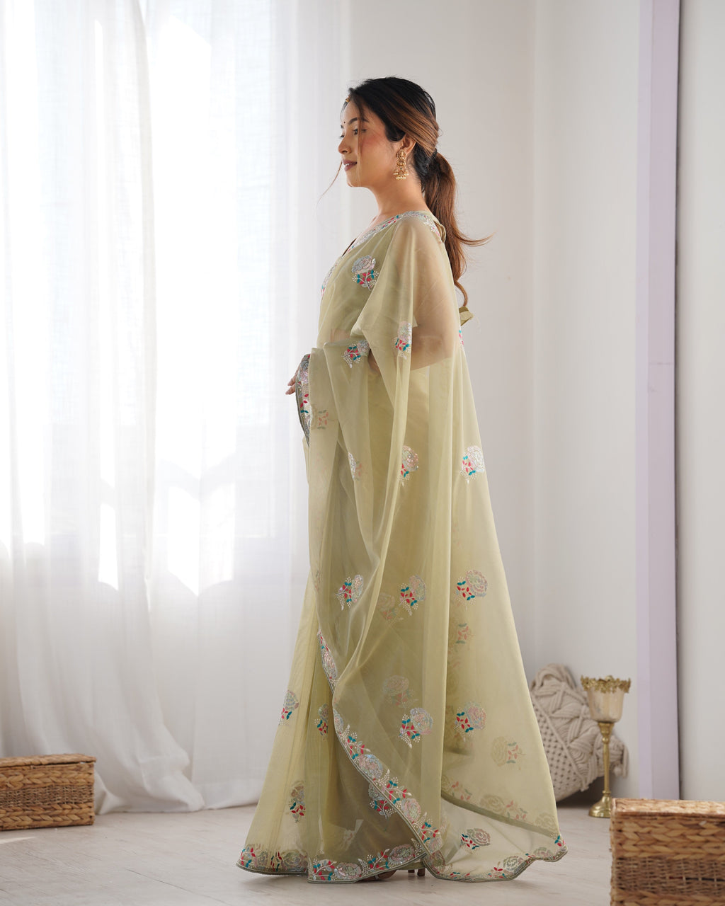 Pista Green Net Saree with Sequins Embroidery and Silk Blouse