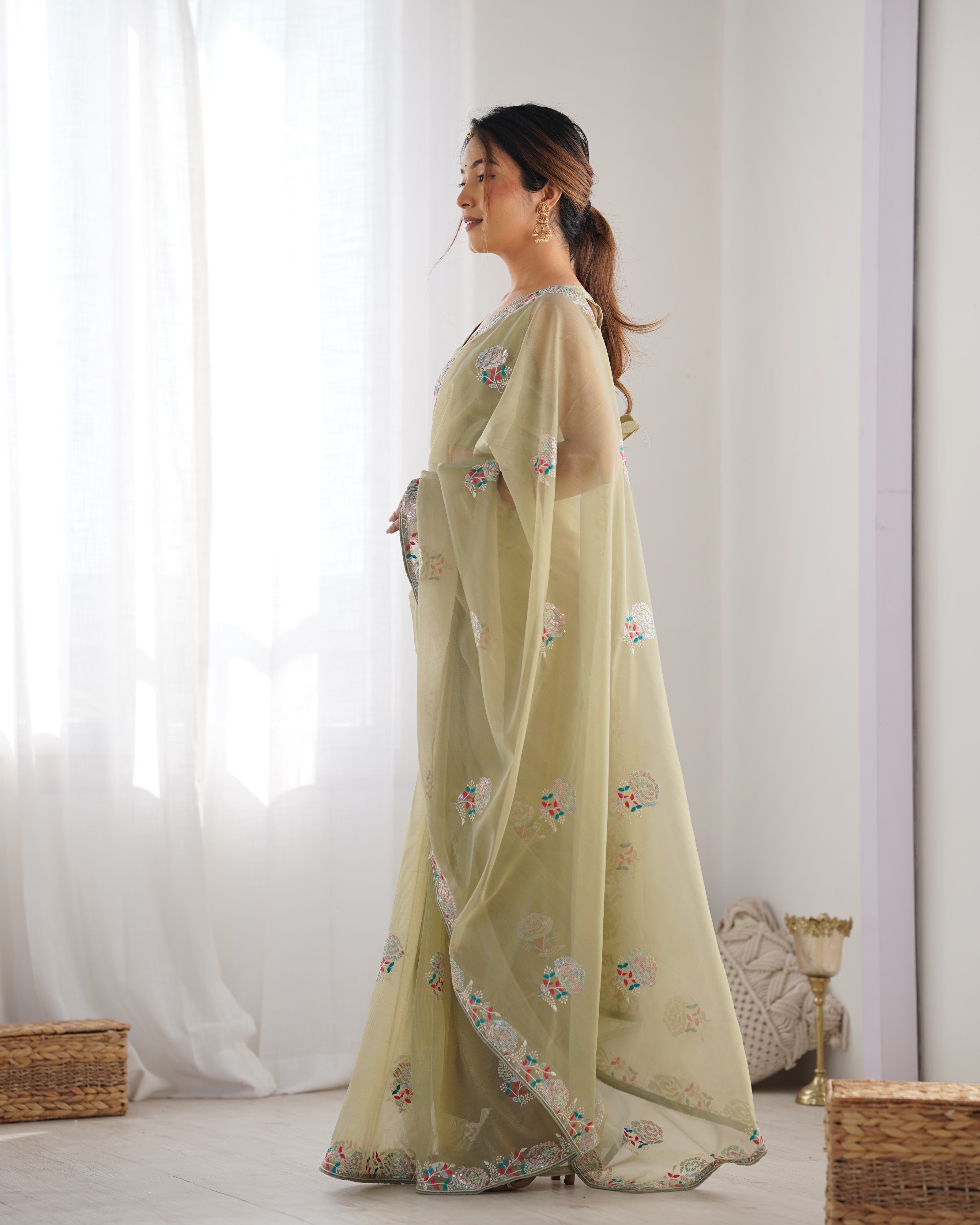 Pista Green Net Saree with Sequins Embroidery and Silk Blouse