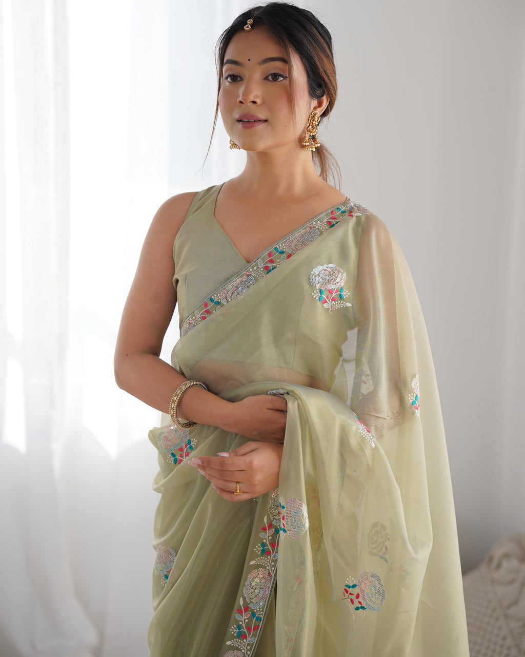 Pista Green Net Saree with Sequins Embroidery and Silk Blouse