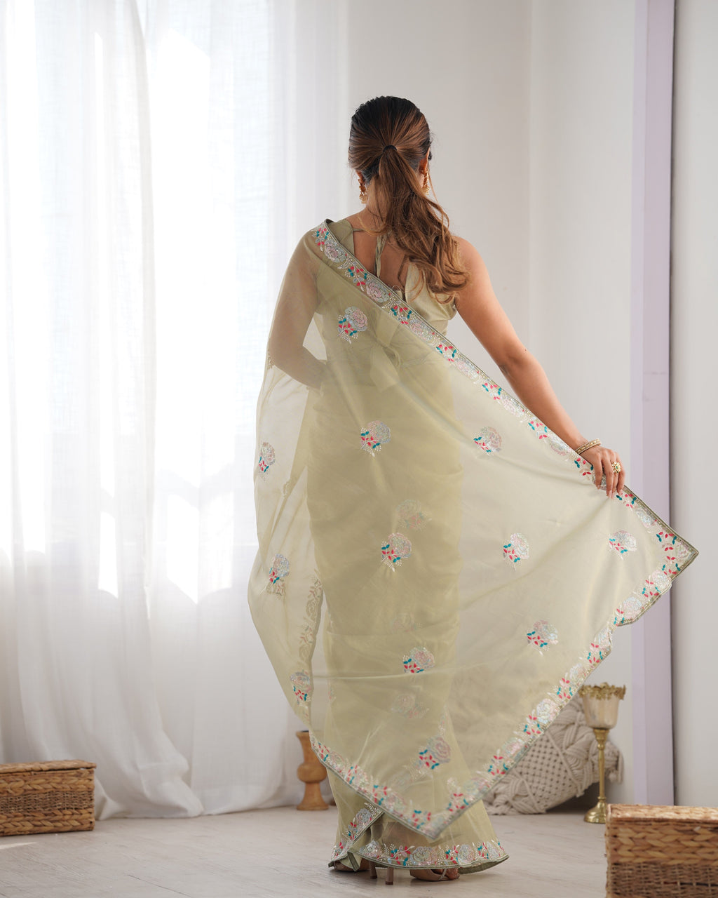 Pista Green Net Saree with Sequins Embroidery and Silk Blouse
