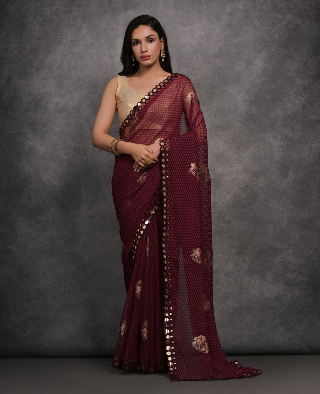 Maroon chiffon designer saree with intricate mirror work