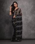 Elegant grey chiffon saree with mirror work embroidery and matching blouse piece