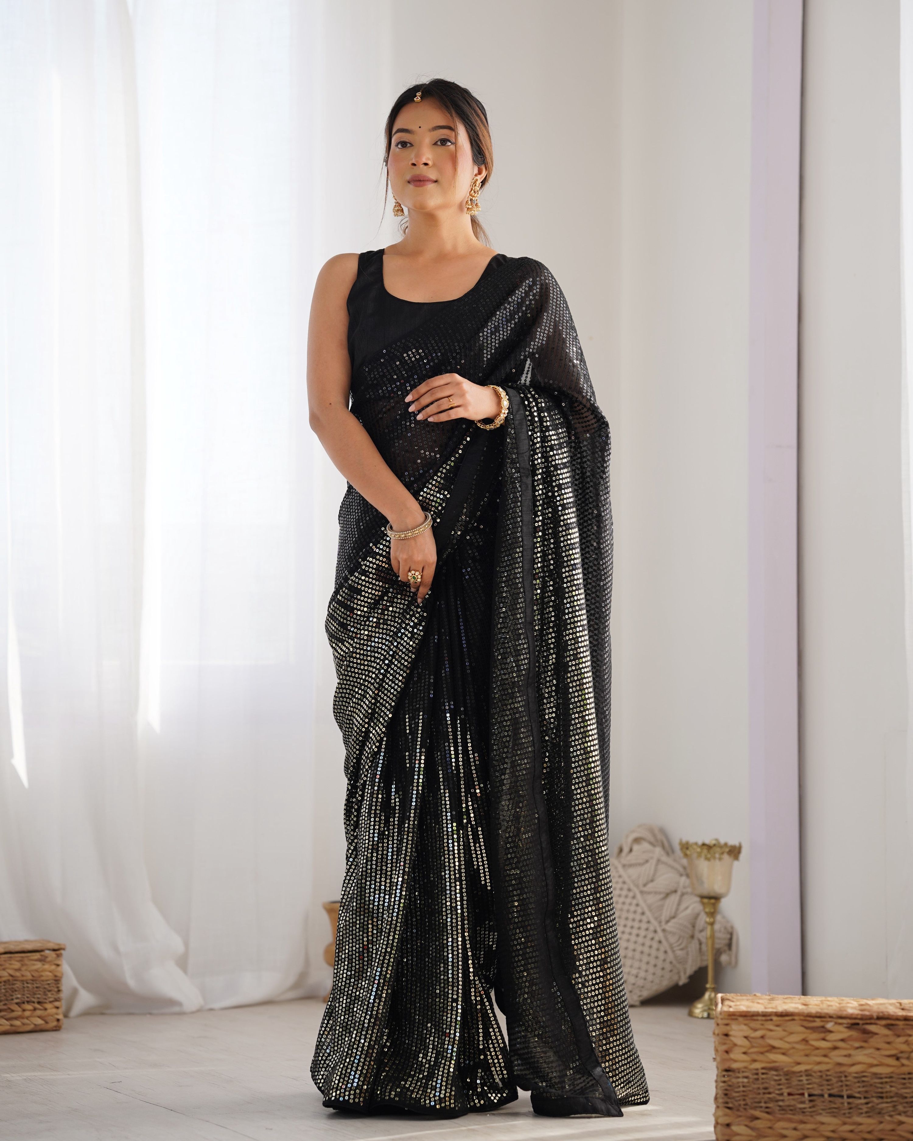Elegant Black Georgette designer saree featuring sparkling sequins work and Banglory Silk blouse.