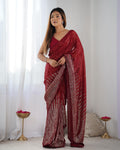Maroon georgette designer saree with elegant sequins detailing and unstitched blouse