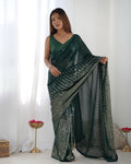 Bottle Green Georgette designer saree adorned with sequins work and Banglory Silk blouse piece.