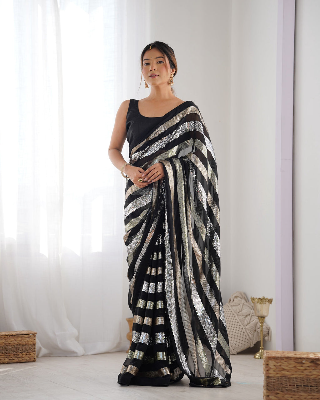 Black georgette designer saree with sequins work