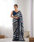 Teal georgette designer saree with sequins and matching blouse piece