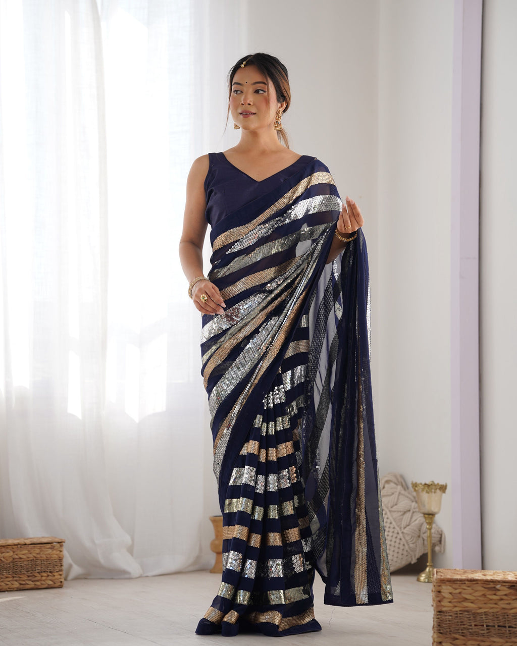 Navy blue georgette saree with designer sequin work and banglory silk blouse