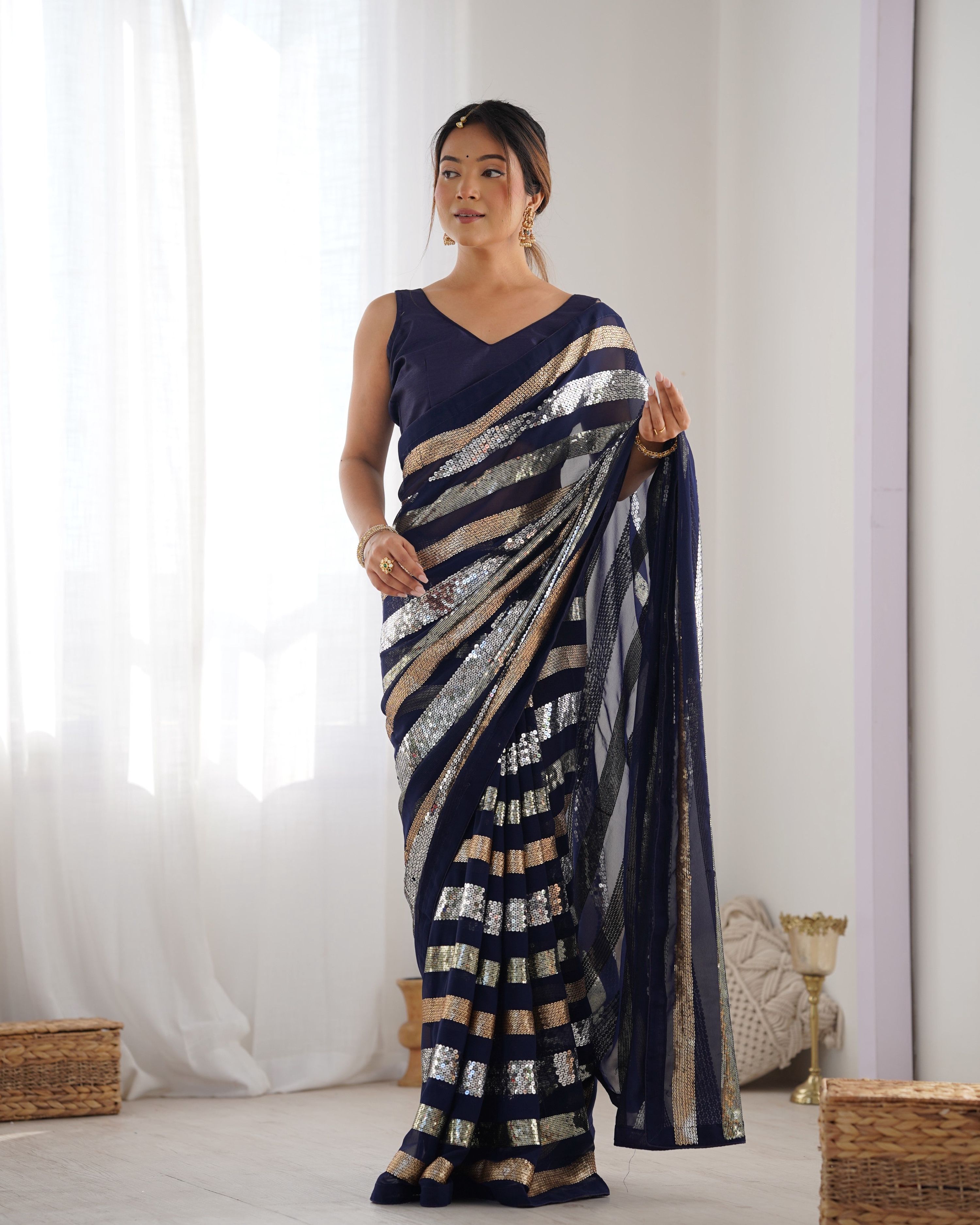 Navy blue georgette saree with designer sequin work and banglory silk blouse