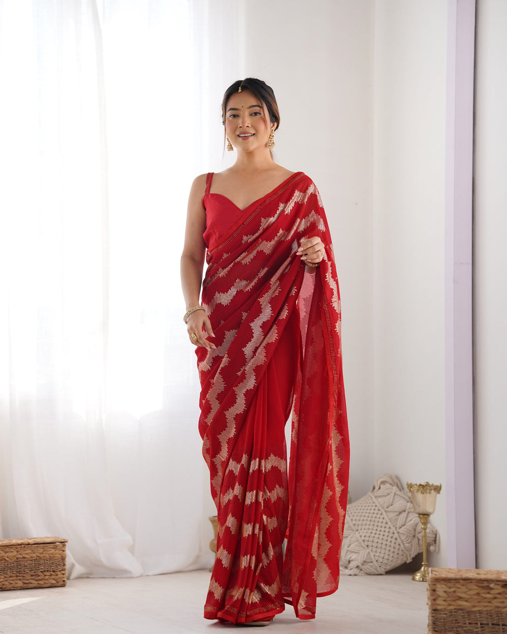 Red georgette designer saree with sequin and swarovski embellishments