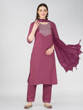 Woman wearing a Wine cotton blend straight kurta with sequins embroidery, elbow-length sleeves, and 46-inch length.
