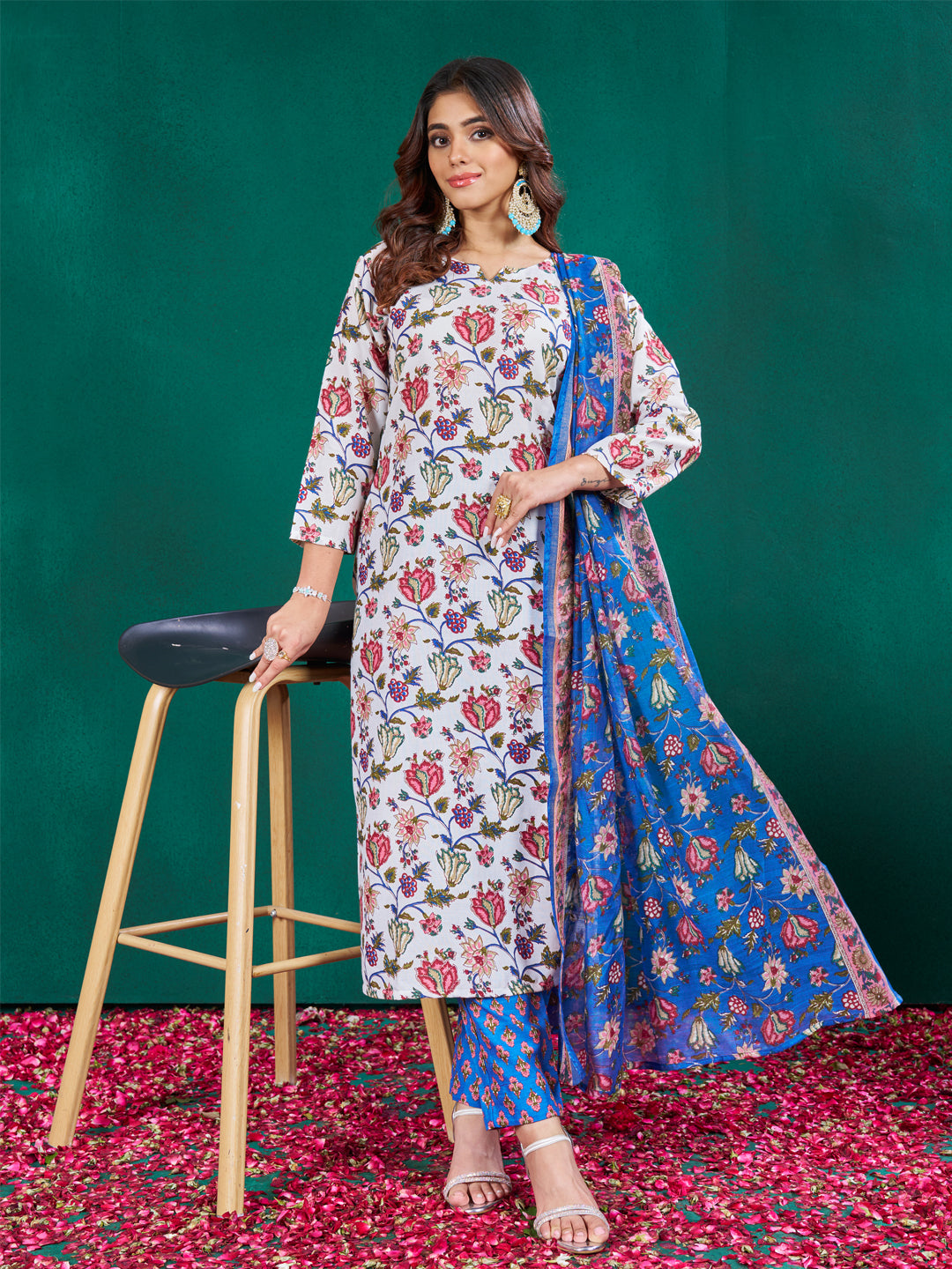 Woman wearing a multicolor floral printed cotton blend straight kurta set with dupatta