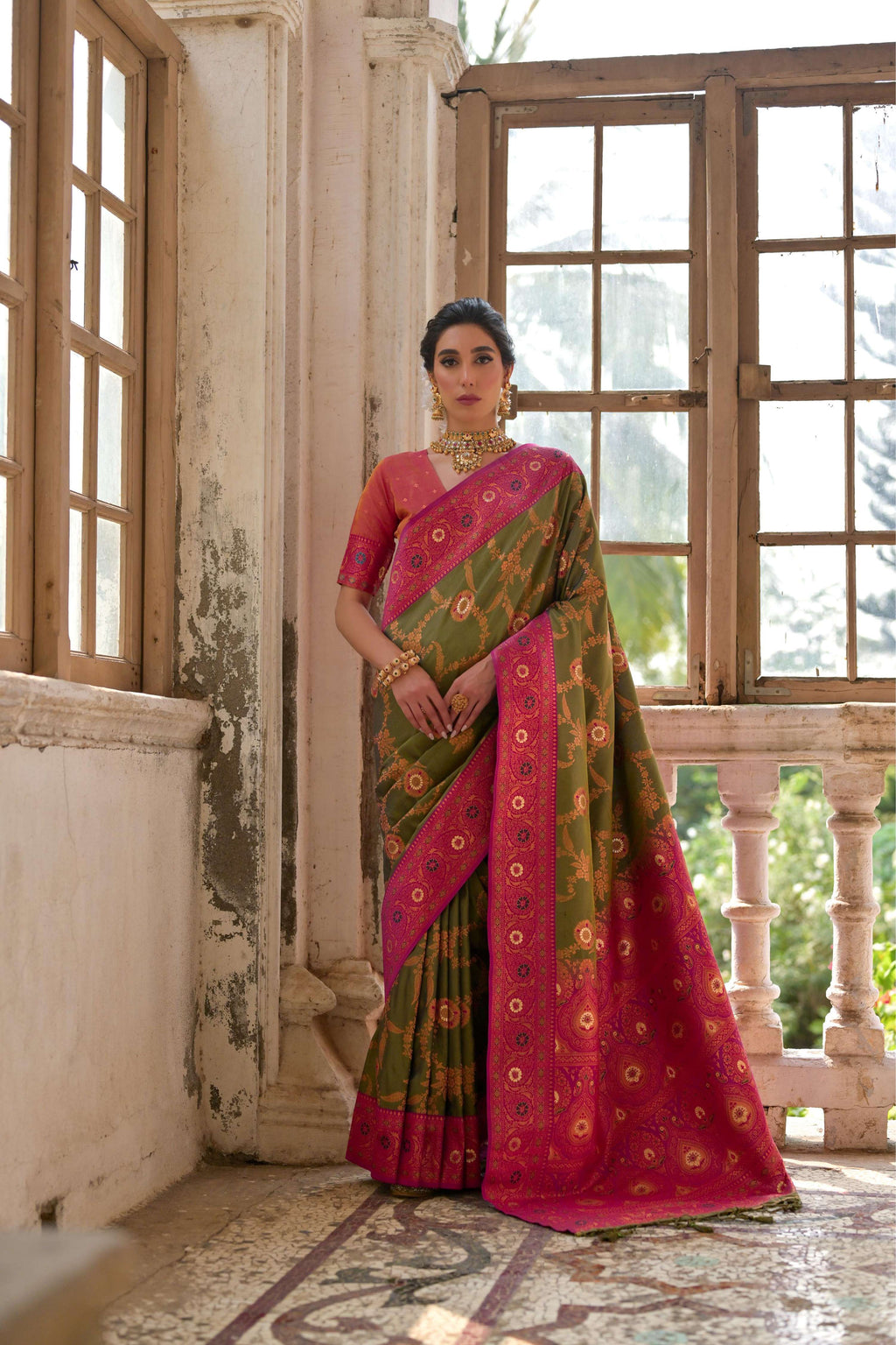 Mehendi colored Banarasi silk saree featuring Zari woven traditional work and matching blouse