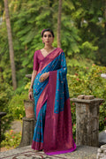 A beautiful blue Banarasi silk saree with traditional gold Zari woven patterns and matching blouse.