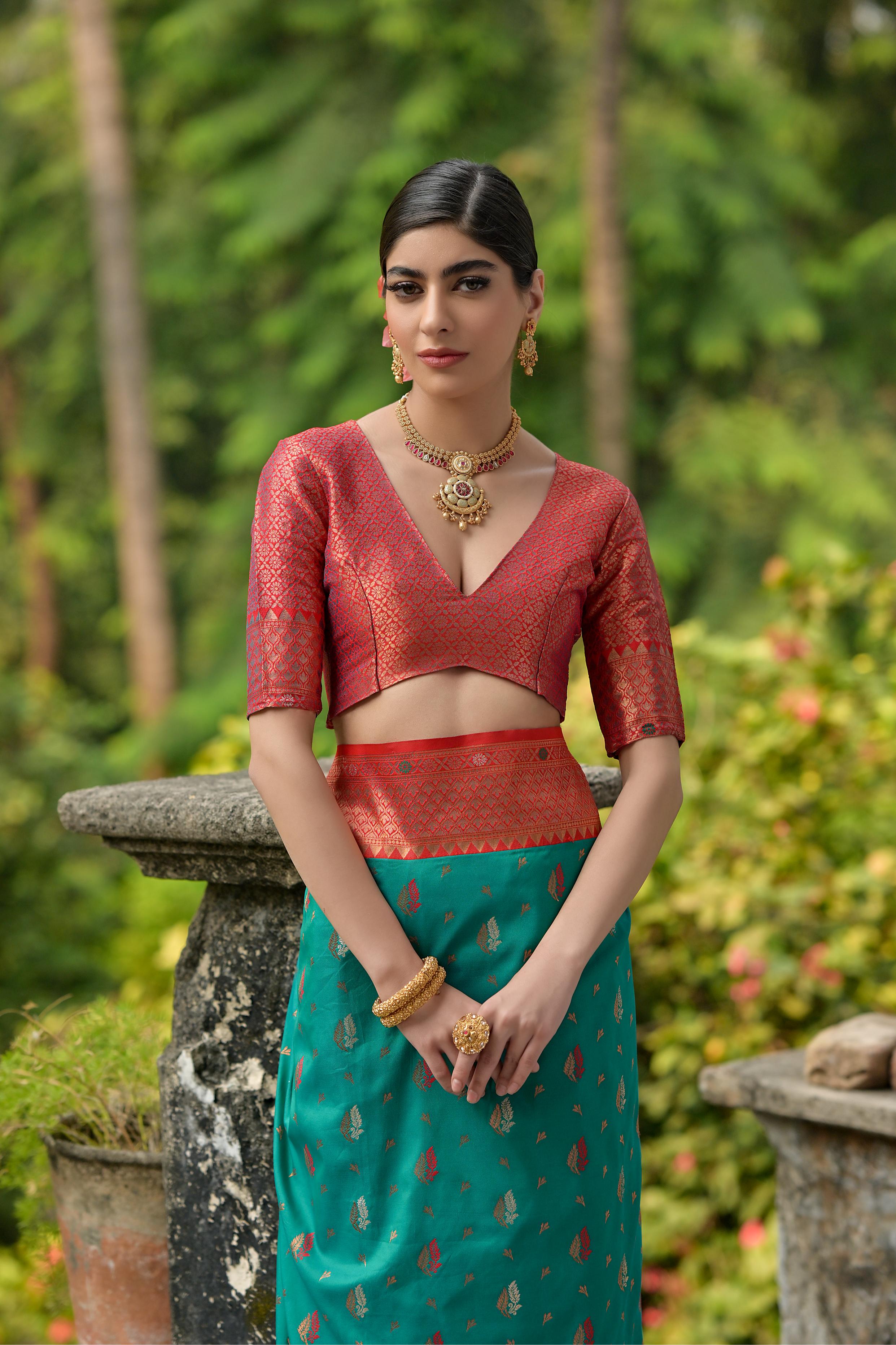 Rama Banarasi Silk Saree with Zari Woven Detail and Blouse
