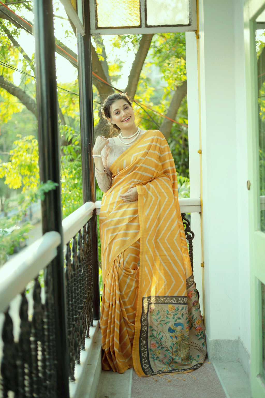 Bright Yellow Tussar Silk Saree featuring traditional Leheriya print and elegant Zari border.