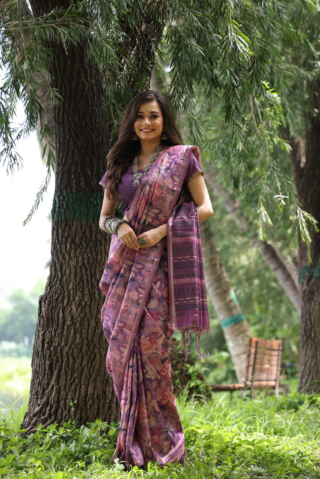 Purple Tussar silk saree with intricate printed design and gold Zari weaving