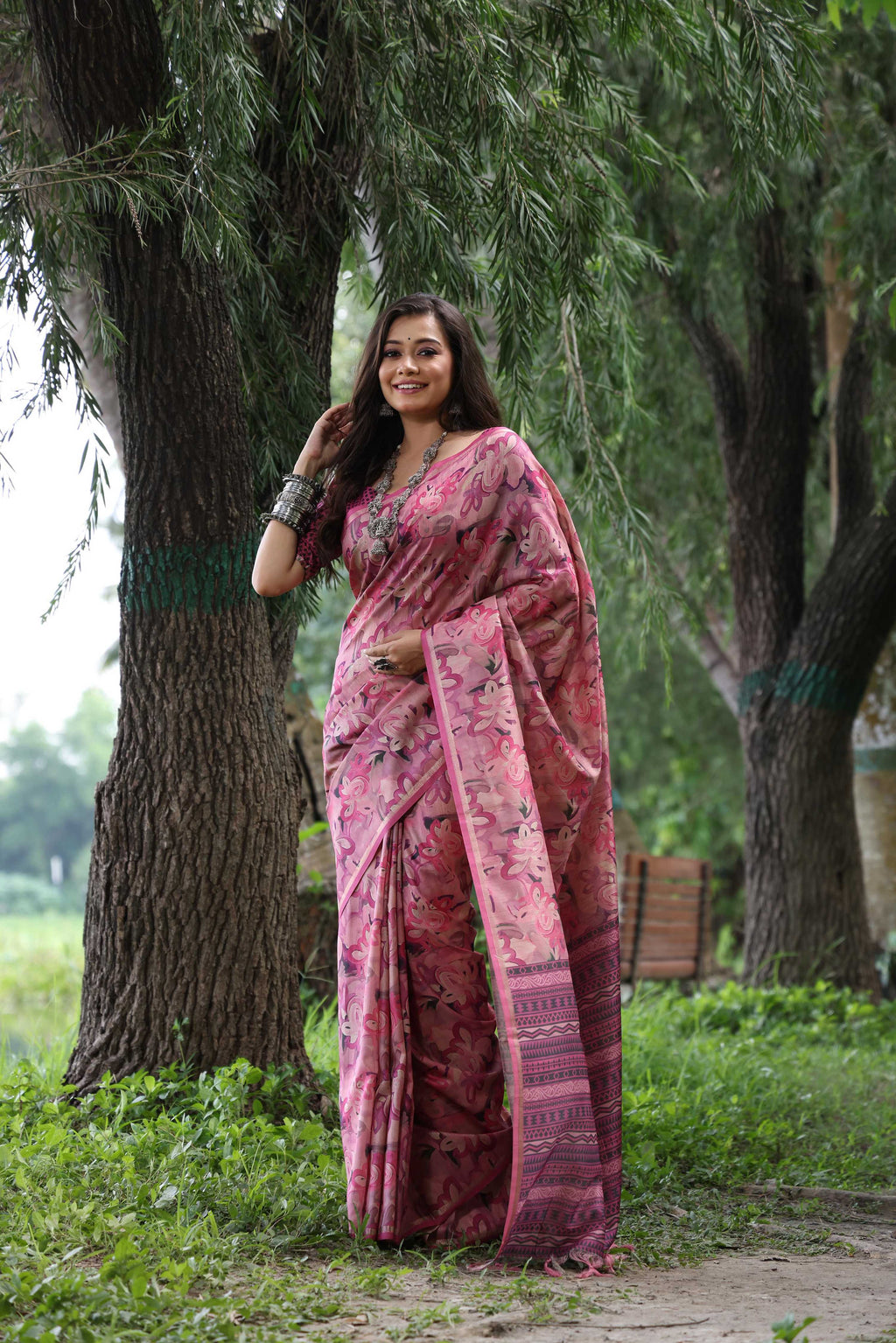 Wine colored soft Tussar silk saree with Zari work and matching blouse.