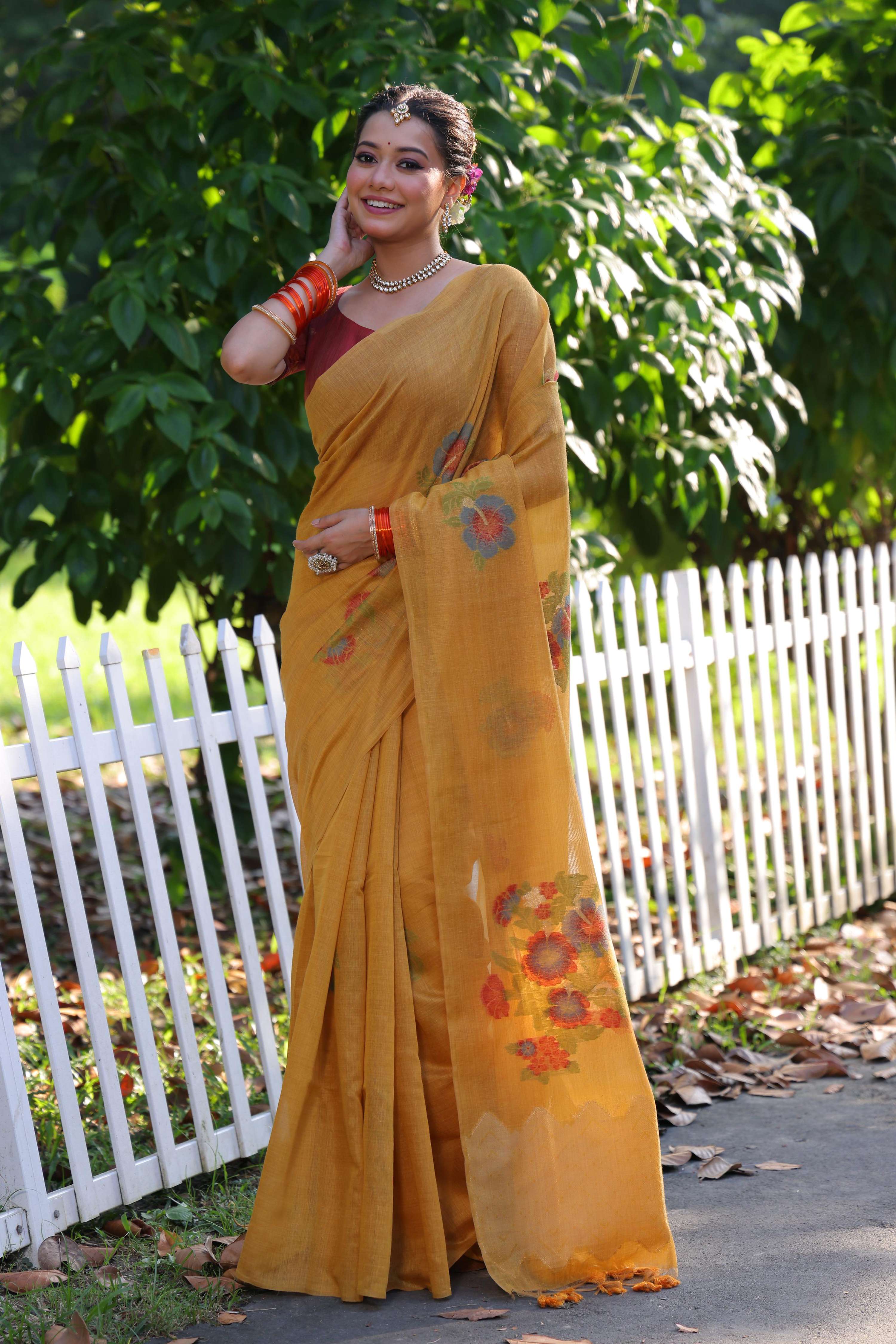 Mustard colored soft Muga cotton saree with Resham Jamdani weaving