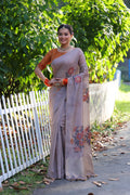Grey traditional saree in soft Muga cotton with intricate Resham Jamdani weaving and matching blouse.
