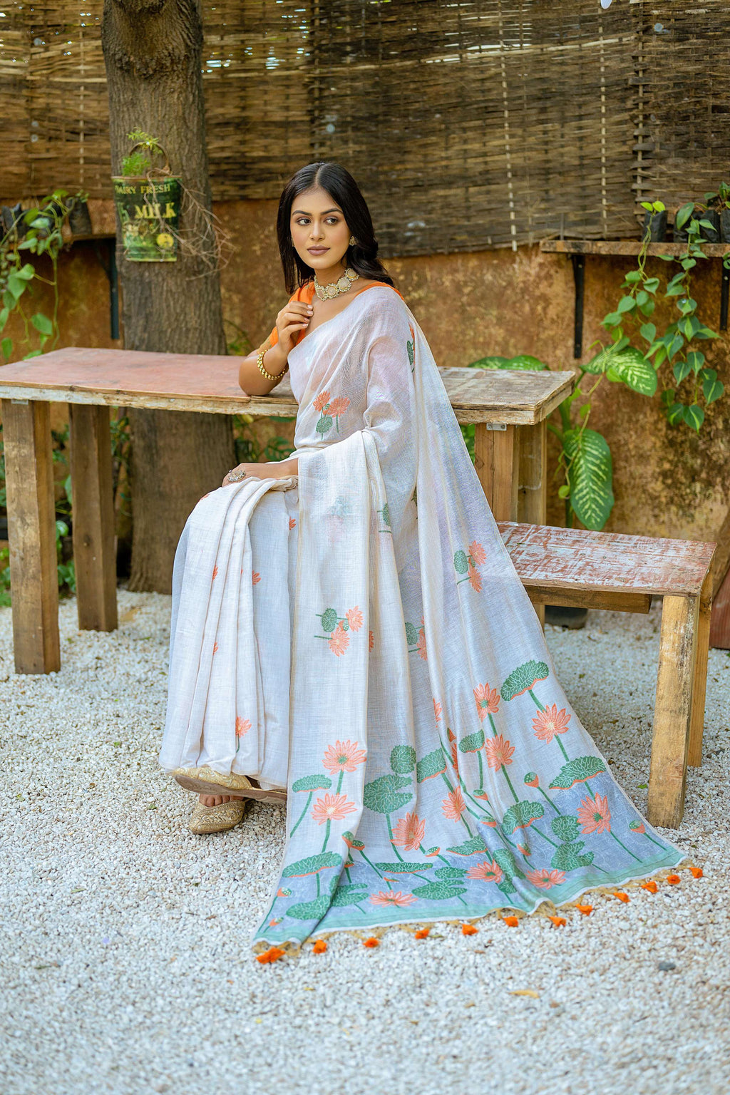 Women's Orange Soft Muga Cotton Saree with Floral Weaving