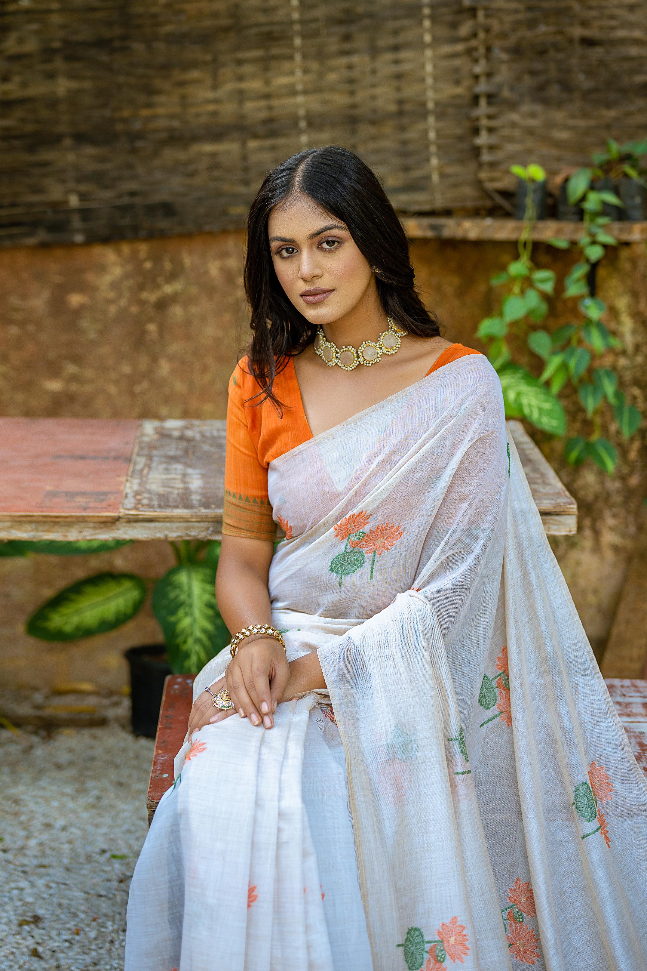 Women's Orange Soft Muga Cotton Saree with Floral Weaving