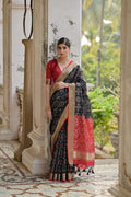 Jyoti Fashion black soft raw silk saree with zari woven accents