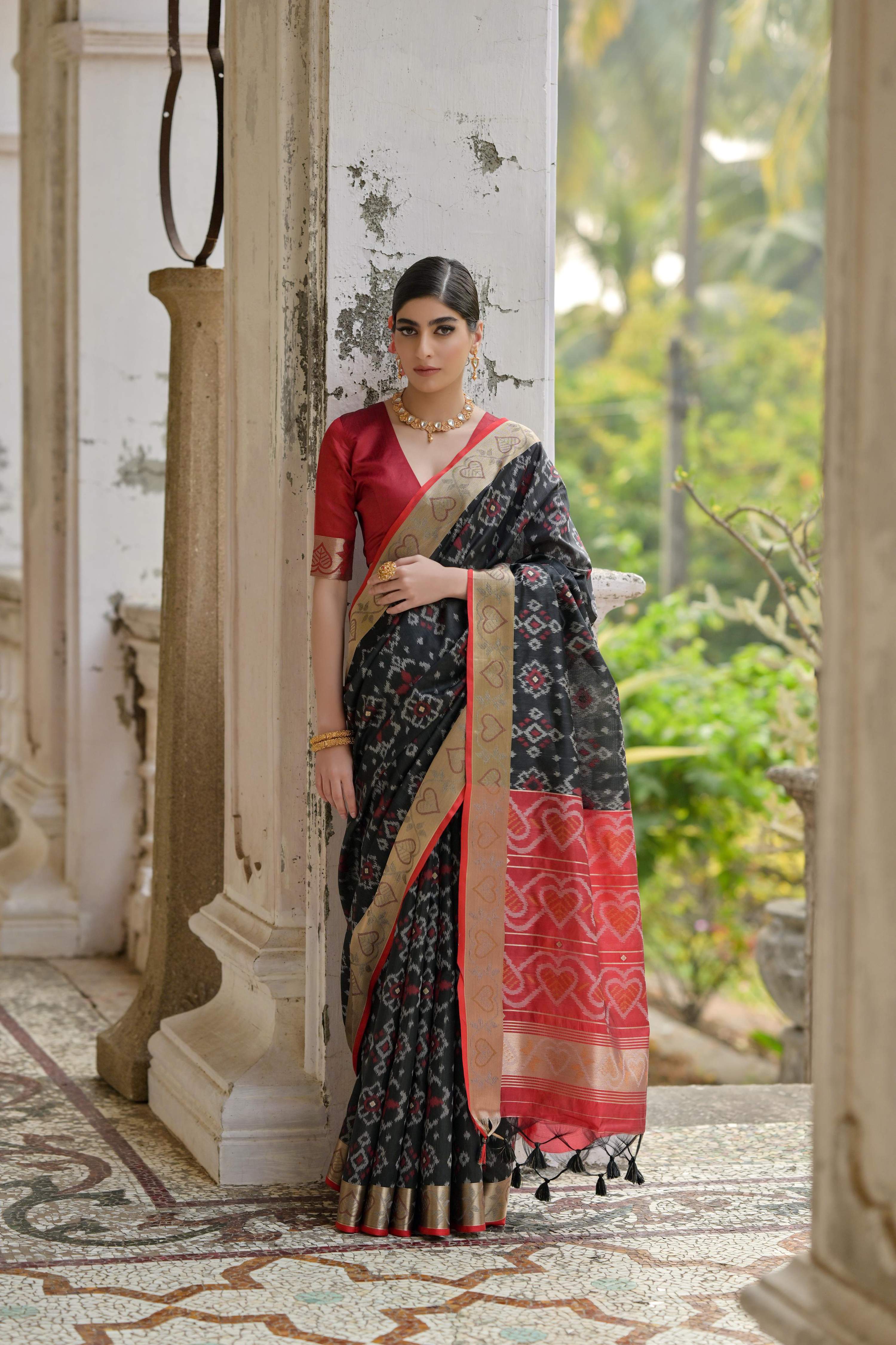 Jyoti Fashion black soft raw silk saree with zari woven accents