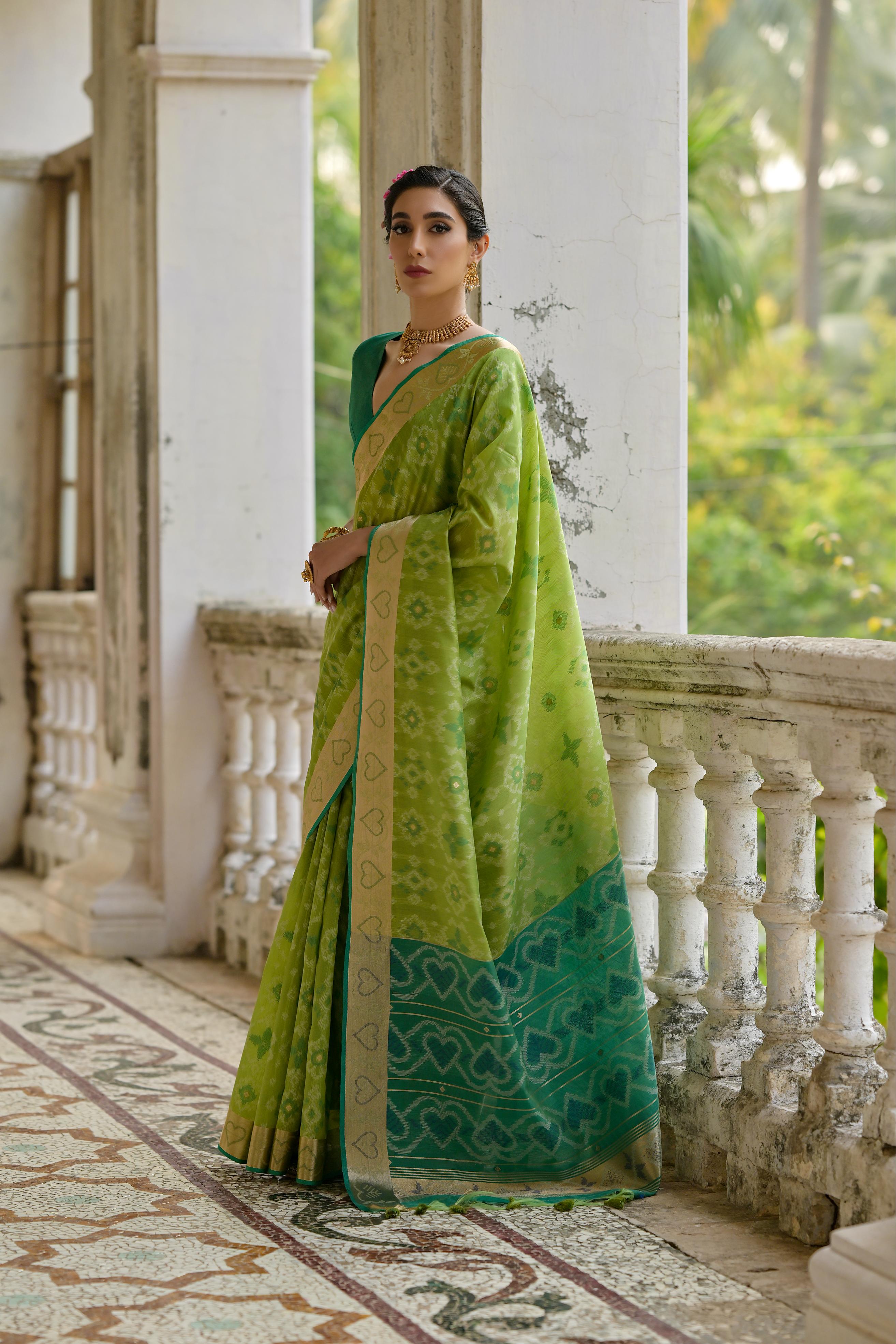 Green Soft Raw Silk Zari Woven Saree with Matching Blouse