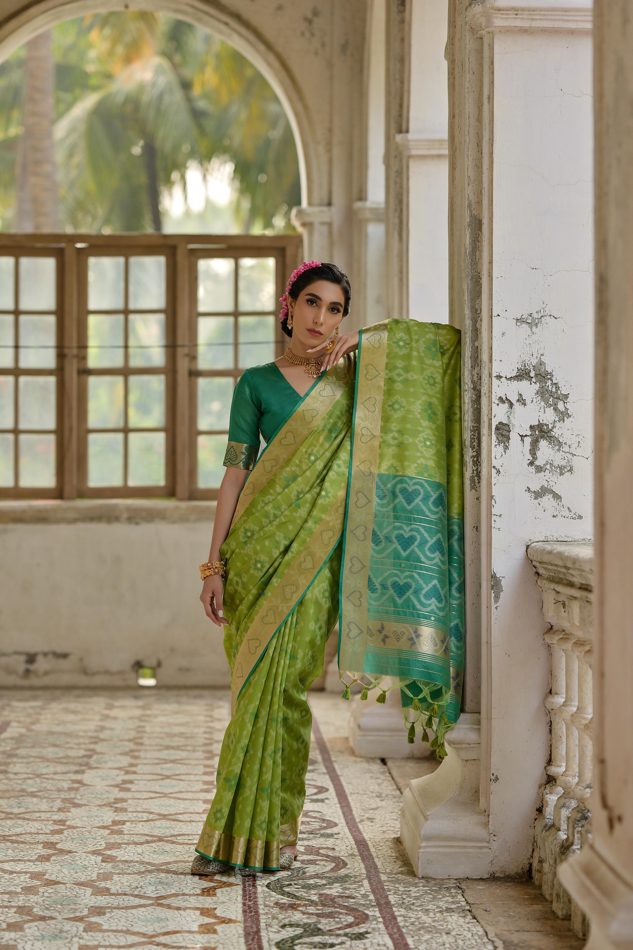 Green Soft Raw Silk Zari Woven Saree with Matching Blouse