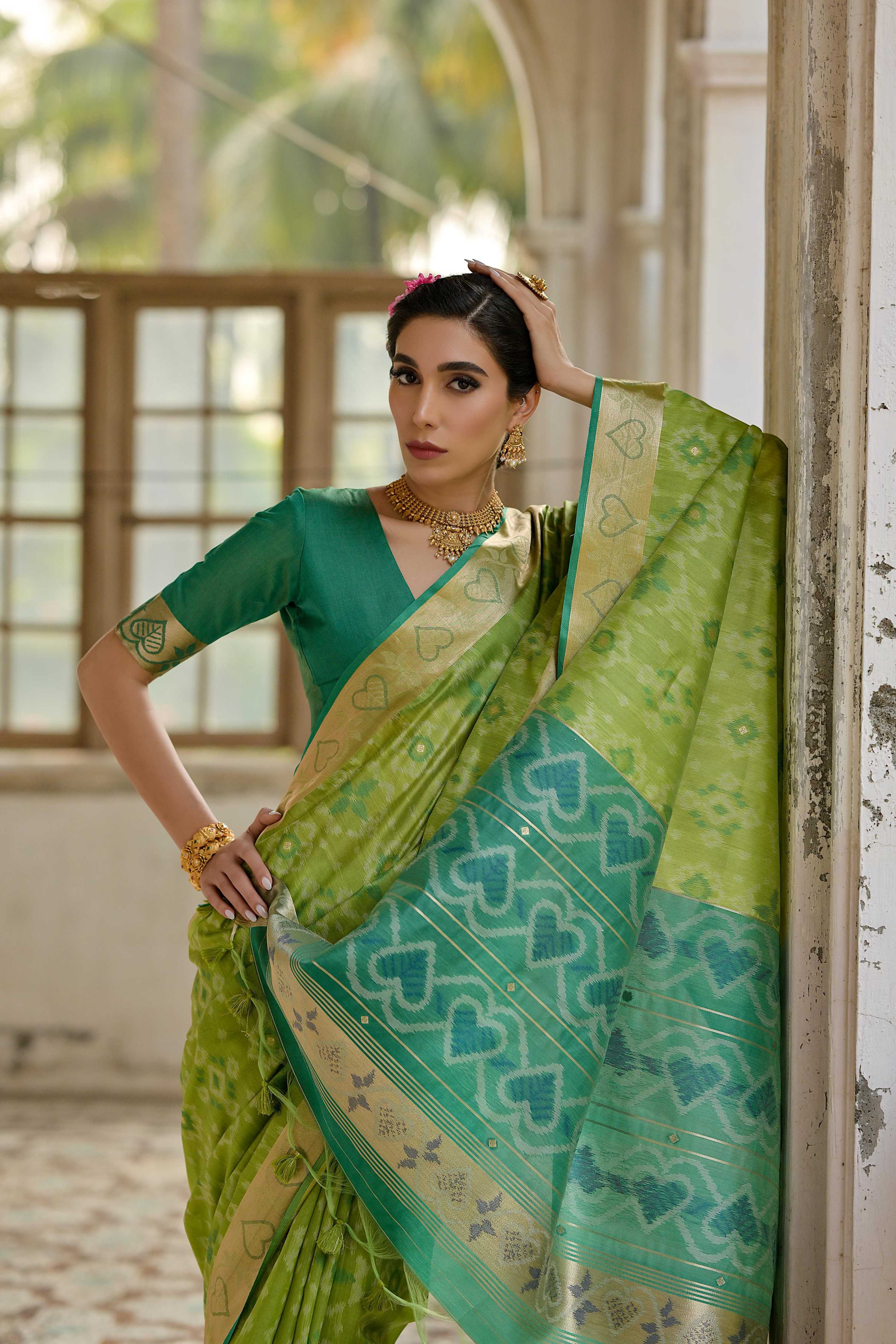 Green Soft Raw Silk Zari Woven Saree with Matching Blouse