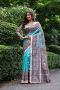 Sky blue soft Tussar silk saree with traditional Madhubani printed patterns and unstitched blouse